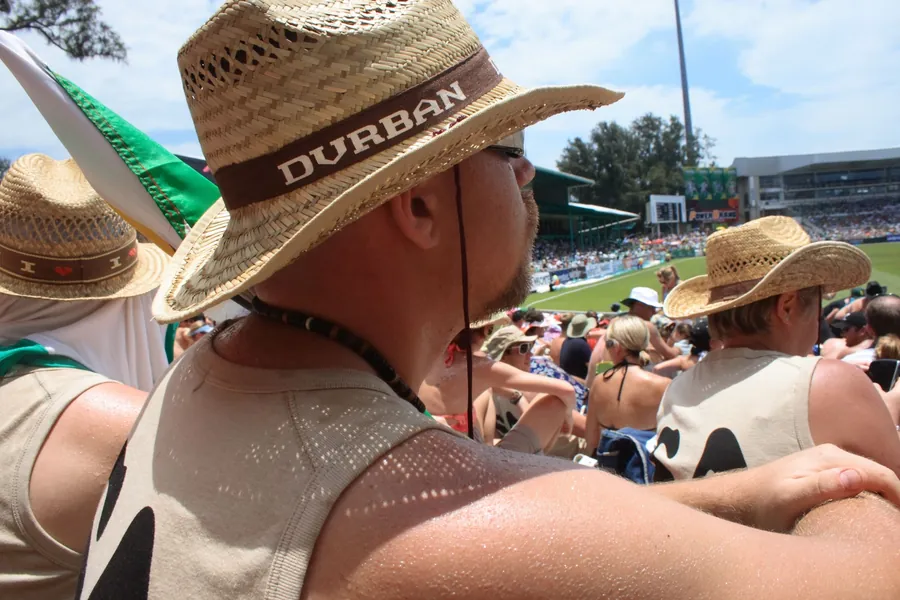 A straw hat with a DURBAN hat band at Kingsmead