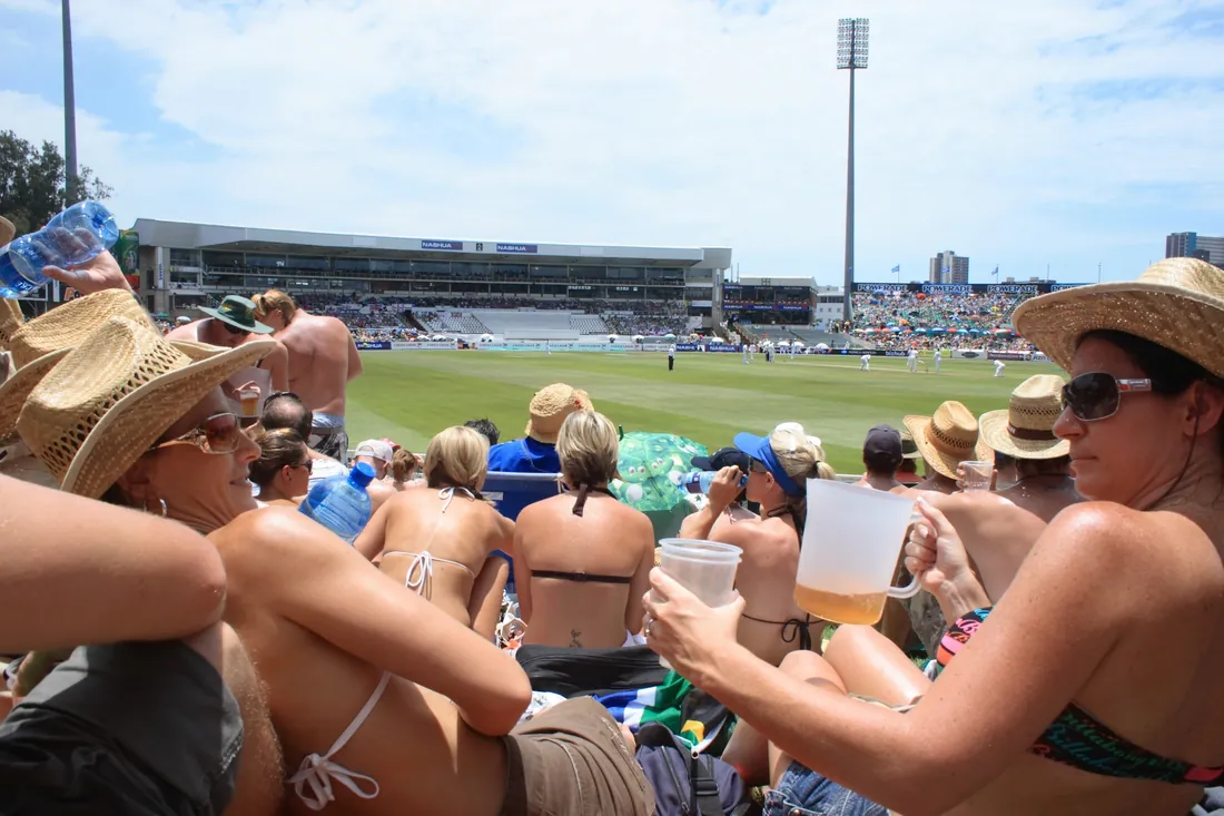 Fans in straw hats on the bank at Kingsmead during a Test